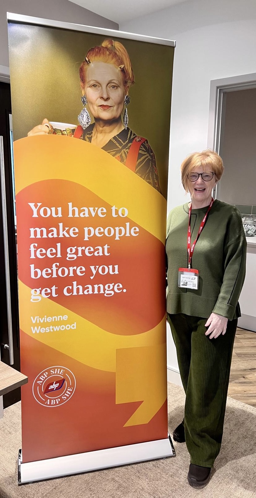 Carol Glover beside a Vivienne Westwood quote